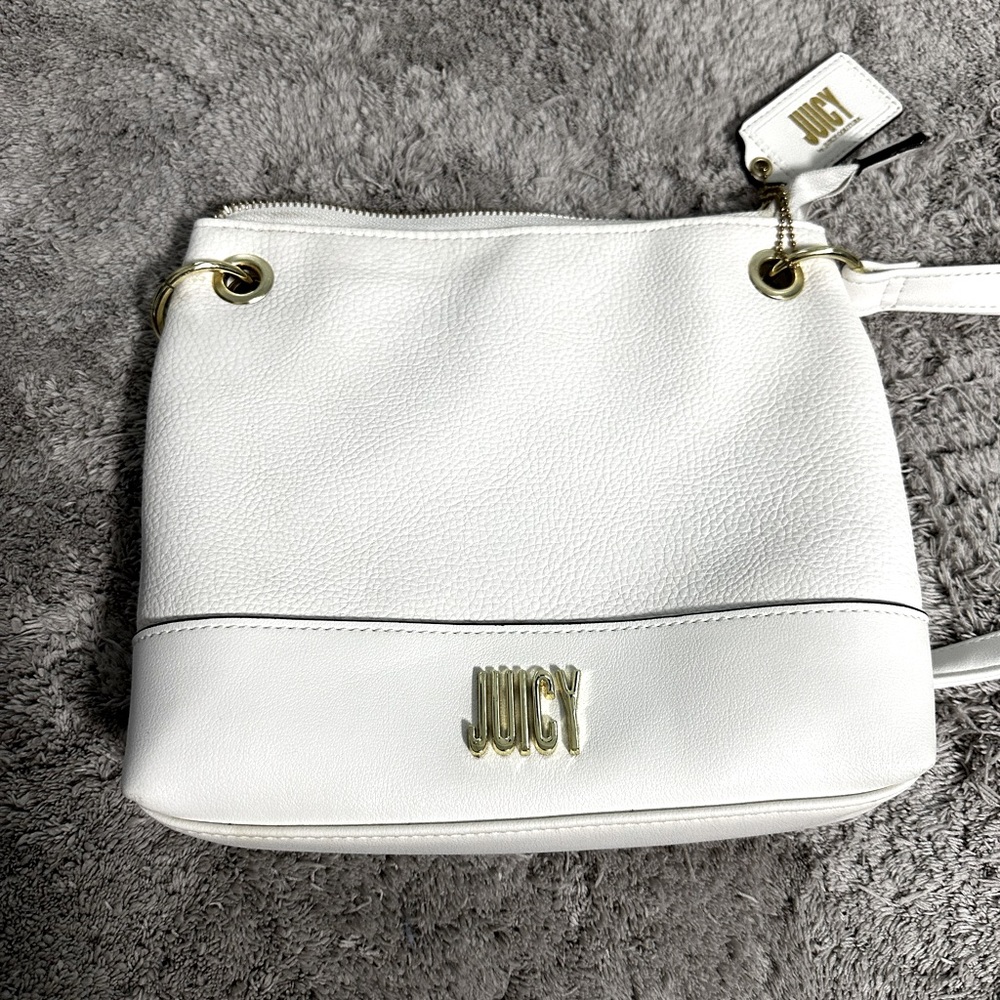 Juicy white crossbody purse. NWOT